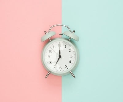 Clock on colorful background